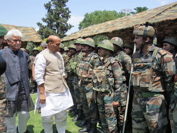 Defence Minister Rajnath Singh interacts with soldiers at the Army Base Camp in Rajouri, Jammu and Kashmir on Saturday. (Photo/ANI)