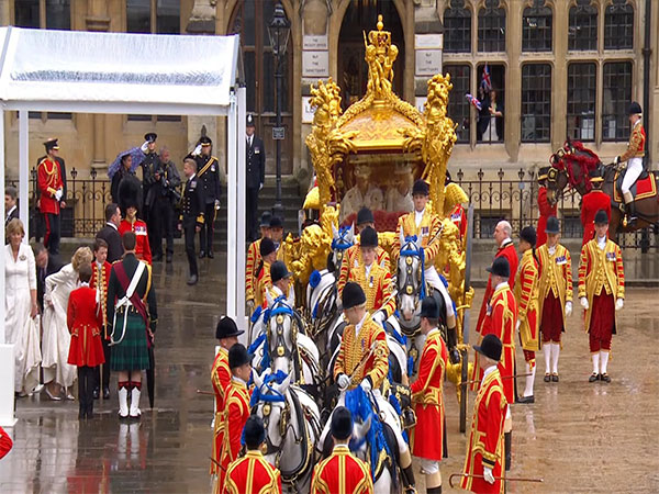 Newly-crowned King Charles III leaves Westminster Abbey in the Gold State Coach to take him back to Buckingham Palace. (Photo Credit: The Royal Family's Youtube)
