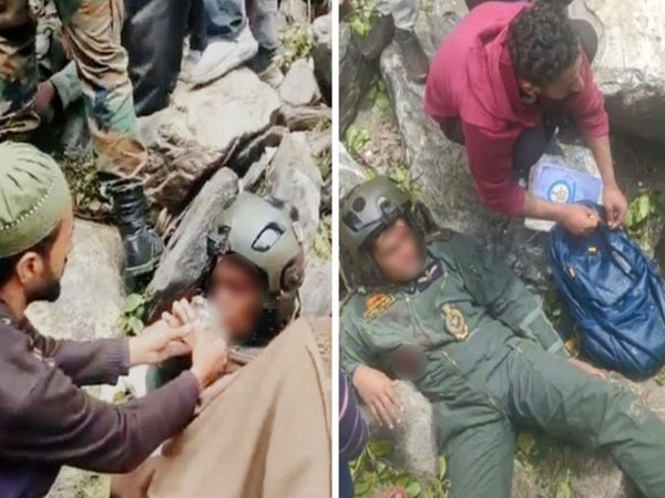 Visuals of locals providing assistance to aircrew after chopper crash (Photo/ Twitter@NorthernComd_IA Indian)