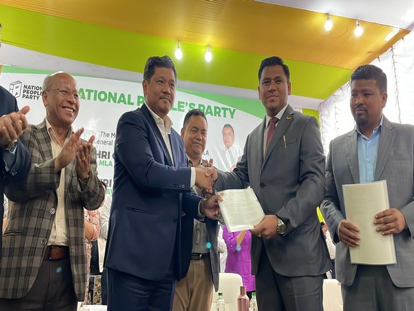 Meghalaya Chief Minister Conrad Sangma welcoming PDF party workers at a party merger event (Photo/Twitter@SangmaConrad )