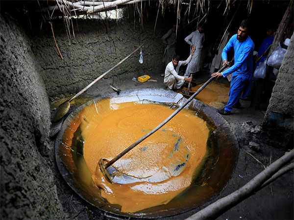 Sweets being prepared at a shop in Nangarhar. (File Photo/Reuters)