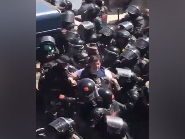 Pakistan former PM Imran Khan being detained by Ranger personnel outside Islamabad High Court on Tuesday. (Photo Credit: Twitter/@PTIofficial)