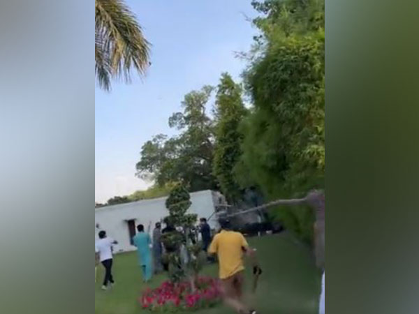 Tehreek-e-Insaaf rioters attack Pakistan Army GHQ. (Photo Credit - Twitter/.Murtaza Ali Shah)