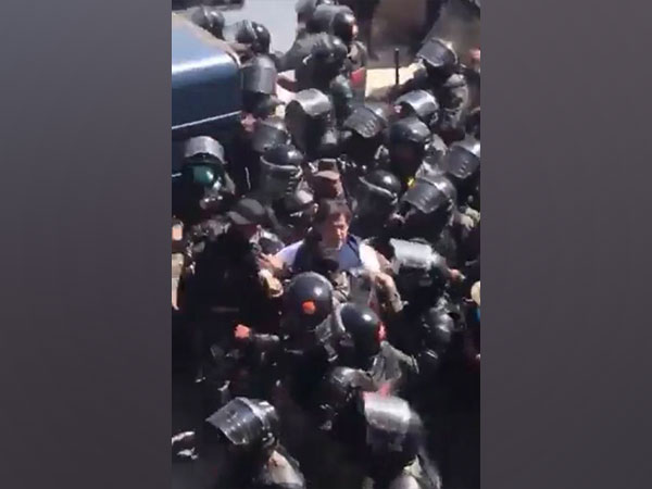 Pakistan former PM Imran Khan being detained by Ranger personnel outside Islamabad High Court on Tuesday. (Photo Credit: Twitter/@PTIofficial)