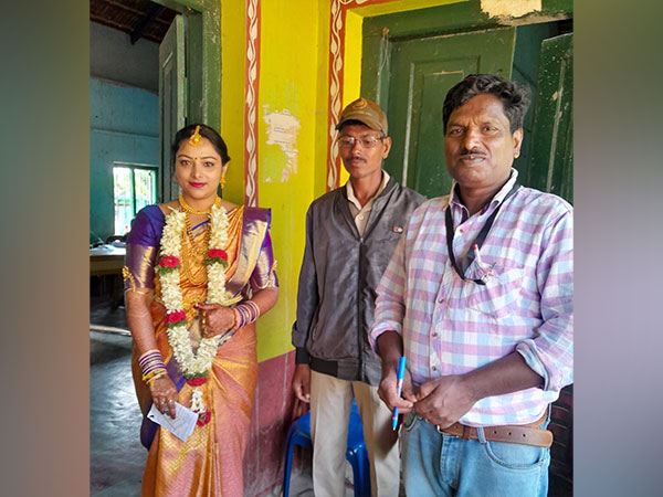 A bride at Mudigere booth in Makonahalli in Karnataka's Chikkamagaluru District (Photo/ANI)