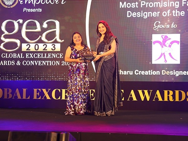 Charu Bhatnagar (Owner, Charu Creation Designer Boutique) receiving the Brand Empower's most prestigious award 