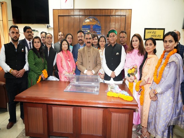 Newly elected Shimla Mayor Surender Chauhan(fourth from the right) posing with  Himachal Chief Minister Sukhvinder Singh Sukhu (Photo/ANI)