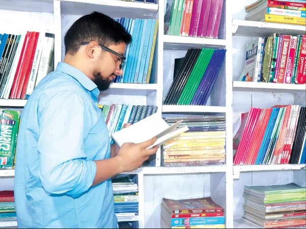 J-K youth Mubashir Mushtaq in his library. (Photo/ANI)