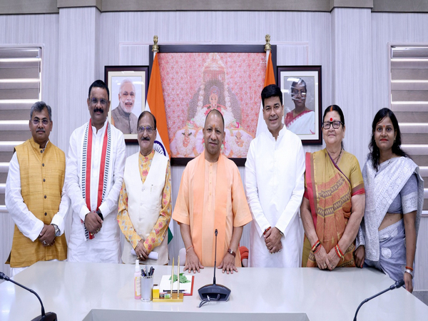 UP CM Yogi Adityanath with newly appointed mayors (Photo/ANI)