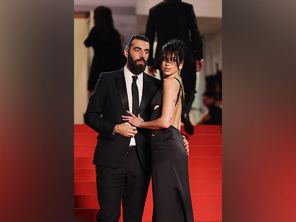 Dua Lipa and Romain Gavras at Cannes.  (Image Source: Twitter)
