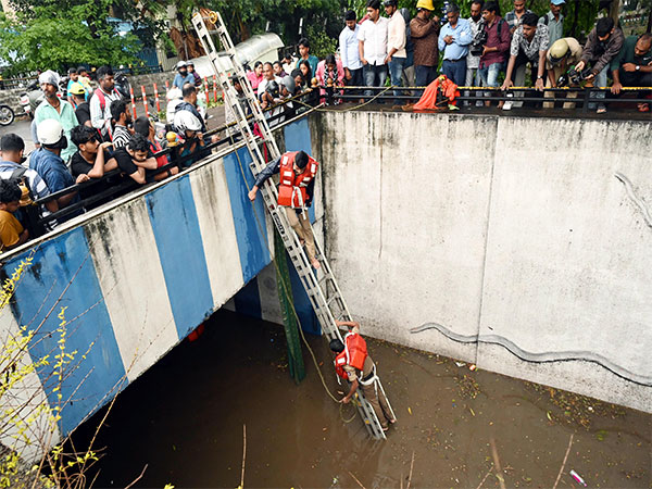 A rescue operation is underway for the people stuck in the underpass as severe waterlogging was witnessed in it after heavy rain and hailstorm lashed Bengaluru on Sunday. (ANI /Photo)