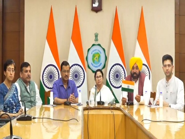 Delhi CM Arvind Kejriwal and West Bengal CM Mamata Banerjee (Centre) (Photo/ANI)