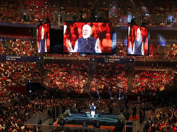 Prime Minister Narendra Modi addressing the Indian diaspora at a community event in Sydney on Tuesday. (Photo Credit: Twitter/@narendramodi)