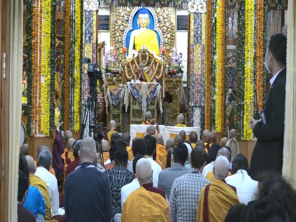 Tibetans and other followers offer prayers for long life of The Dalai Lama on Wednesday. (Photo/ANI)