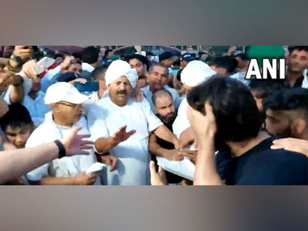 BKU national president with protesting wrestlers (Photo/ANI)