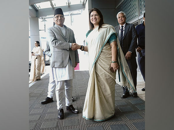 Nepal Prime Minister Pushpa Kamal Dahal and Union Minister Meenakashi Lekhi. (Photo: ANI)
