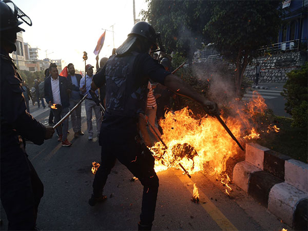 Opposition burns Nepal PM and Presidents while protesting against Citizenship Ammendment Bill. (Photo/ANI)