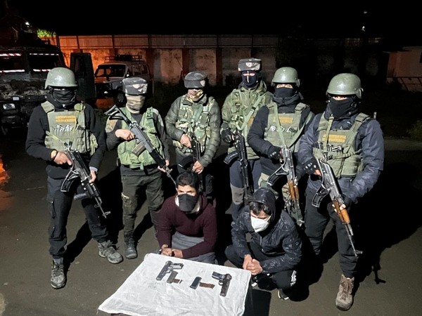 Arrested persons with police in Baramulla (Photo/ANI)