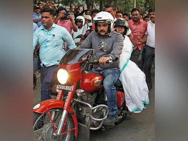 WB CM Mamata Banerjee rides pillion on bike in Kolkata (Photo/ANI)
