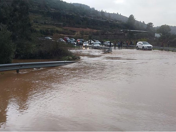 A flooded road near Neve Tzuf in Samaria after heavy rains (Photo Credit: TPS)
