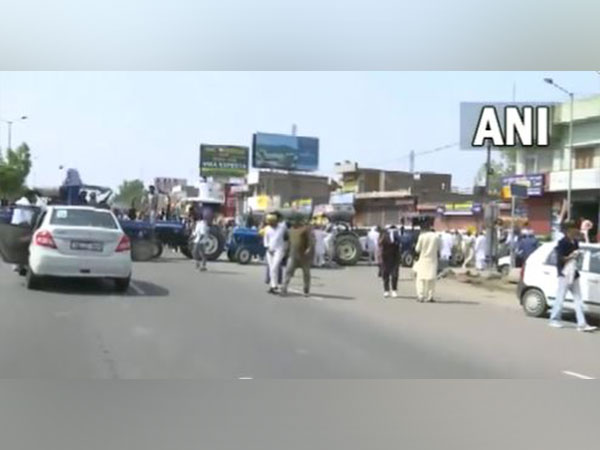Farmers block road in Haryana's Kurukshetra. (Photo/ANI)