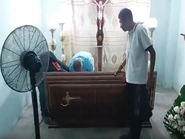 The woman was heard knocking on her coffin (Photo/Twitter)