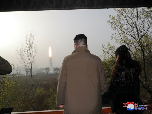 North Korean leader Kim Jong Un and his daughter Kim Ju Ae view a test launch of ballistic missile in April 2023 (Photo Credit: Reuters)