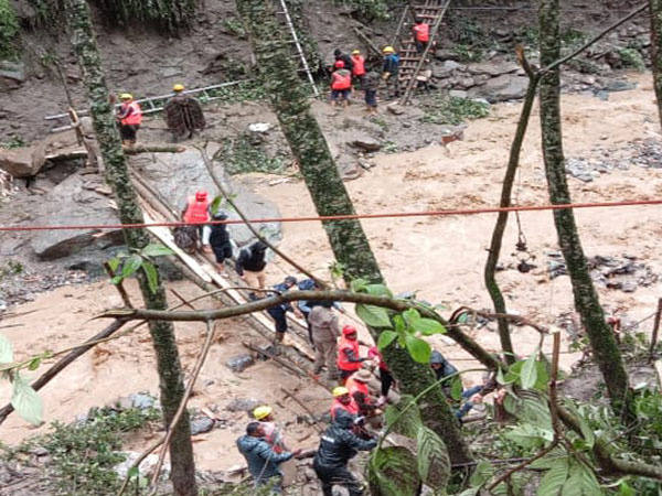 Indian Army restoring a bridge swept away in landslide after heavy rains lashed Sikkim on Friday(Photo/ANI)