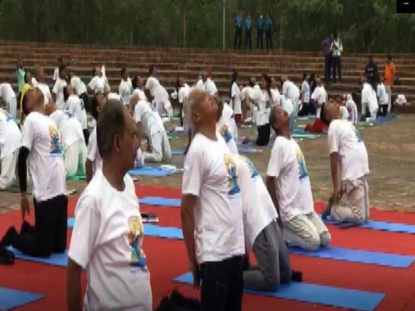 Yoga enthusiasts performed various 'asanas' at Lumbini on Tuesday. (Photo/ANI)