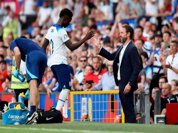 England manager Gareth Southgate and Bukayo Saka (Twitter: Photo/England)
