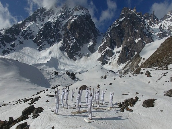 Indian Army personnel doing Yoga in snow in Sikkim. (ANI/photo)