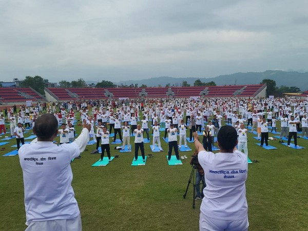 Hundreds perform Yoga in Nepal's Pokhara on Wednesday (Photo/ANI)