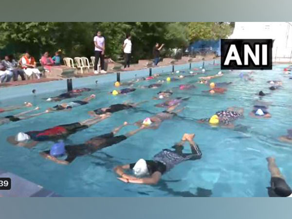 Women's performing 'Aqua Yoga' at Gujarat's Rajkot (Photo/ANI)