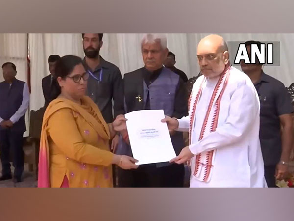 Union Home Minister Amit Shah hands over job appointment letters. (Photo/ANI)