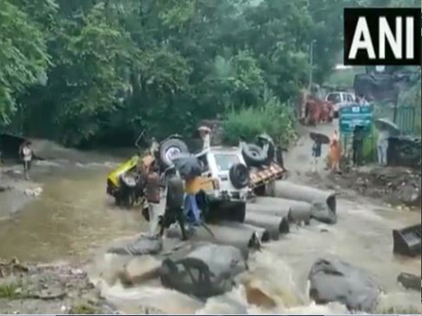 Atleast 8 vehicles were damaged due to heavy rains in Kullu. (Photo/ANI)