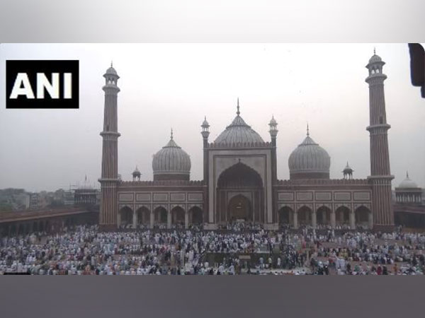 Devotees gather outside Delhi's Jama Masjid to offer prayers (Photo/ANI)