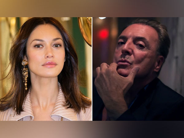 Olga Kurylenko and Armand Assante (Image source: Twitter)