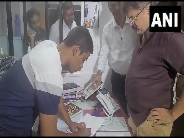 NCP leader Jitendra Awhad hands over his appointment letter (Photo/ANI)