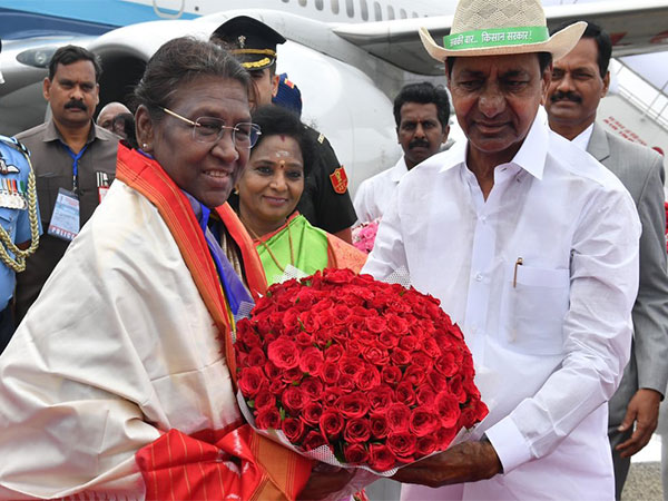 Chief Minister K Chandrashekar Rao receives President Droupadi Murmu upon her arrival at Secunderabad in Hyderabad (Photo/ANI)