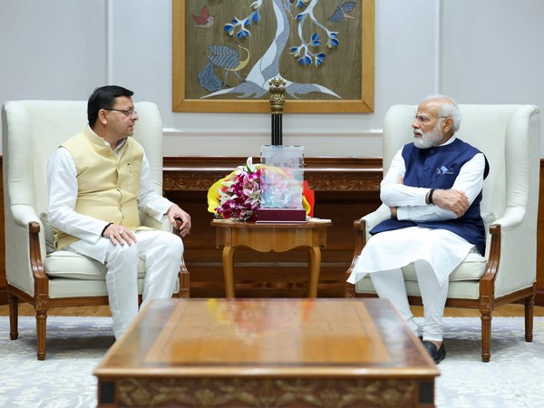 Uttarakhand Chief Minister Pushkar Singh Dhami and Prime Minister Narendra Modi. (Photo/ANI)