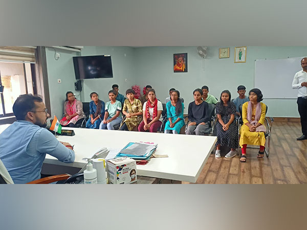 Dantewada Collector Vinit Nandanwar interacting with students (Photo/ANI)