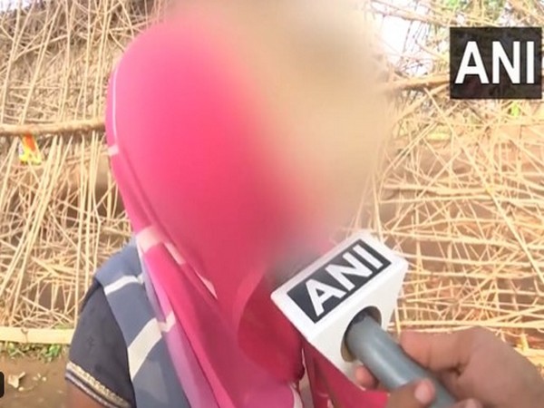 Wife of the victim in Sidhi incident (Photo/ANI)