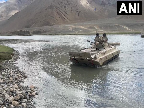 Indian Army's BMP combat vehicle crossing Indus River in Eastern Ladakh for a drill to attack enemy positions (Photo/ANI)