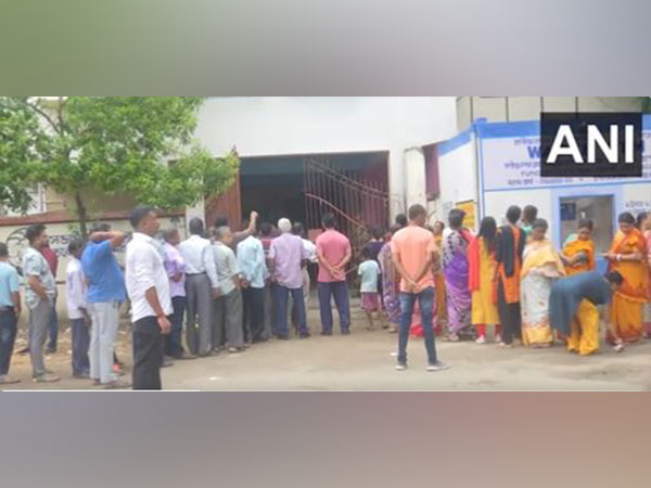 Voters line up outside a polling both  to cast their votes for West Bengal Panchayat Elections (photo/ANI)
