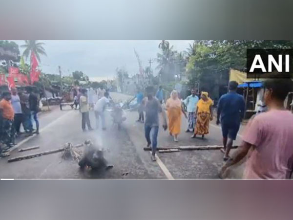 Locals blocked the road after a booth agent was killed as violence mars West Bengal Panchayat polls on Saturday (Photo/ANI)