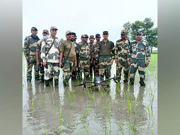 BSF troops with Pakistani drone (Photo/ANI)