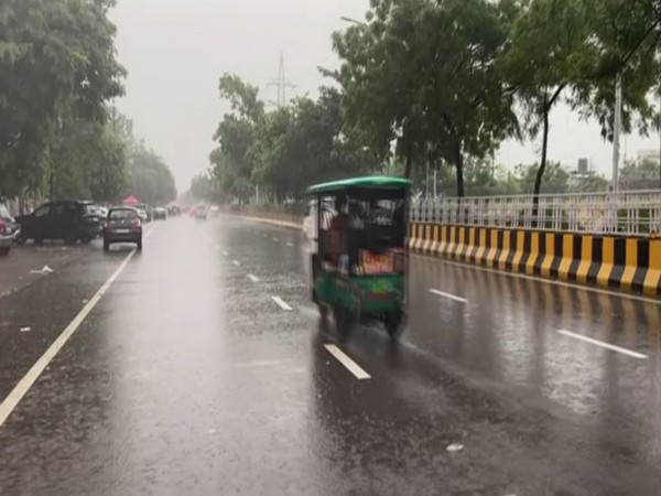 Rain lashes parts of Noida. (Photo/ANI)