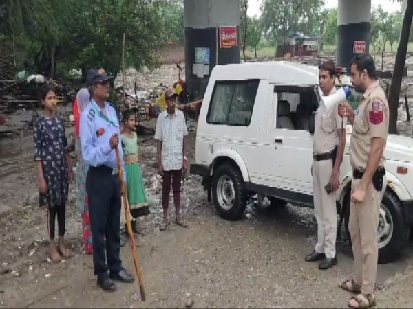 Police officials appealing to local residents (Photo/ANI)
