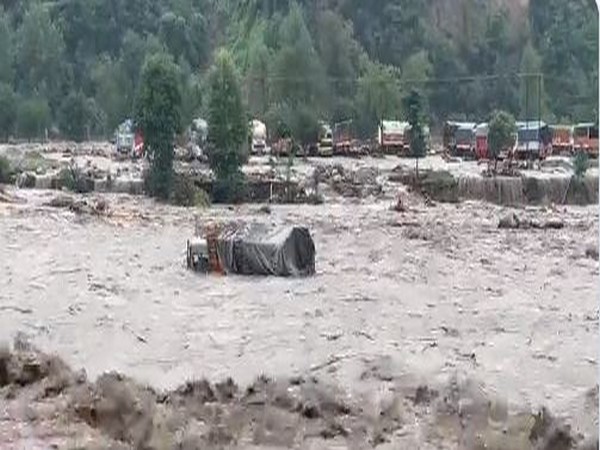 A truck in furiously flowing Beas river in Himachal Pradesh (Photo/ANI)