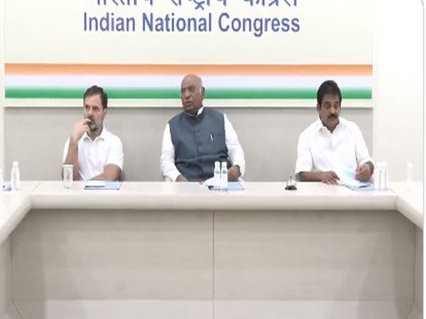 Congress national leaders, Mallikarjun Kharge (centre), Rahul Gandhi (left) and KC Venugopal (right), at AICC office in Delhi. (Photo/ANI)